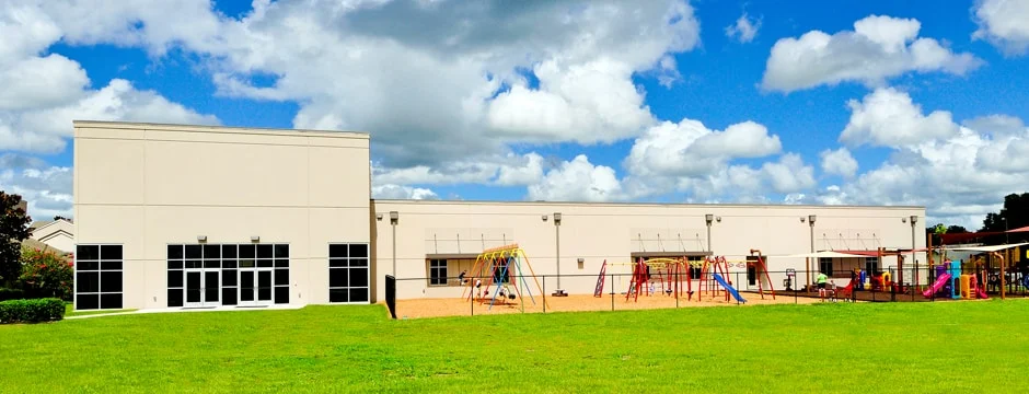 Building God's Way Church Architect First Baptist Church exterior view of playground and building