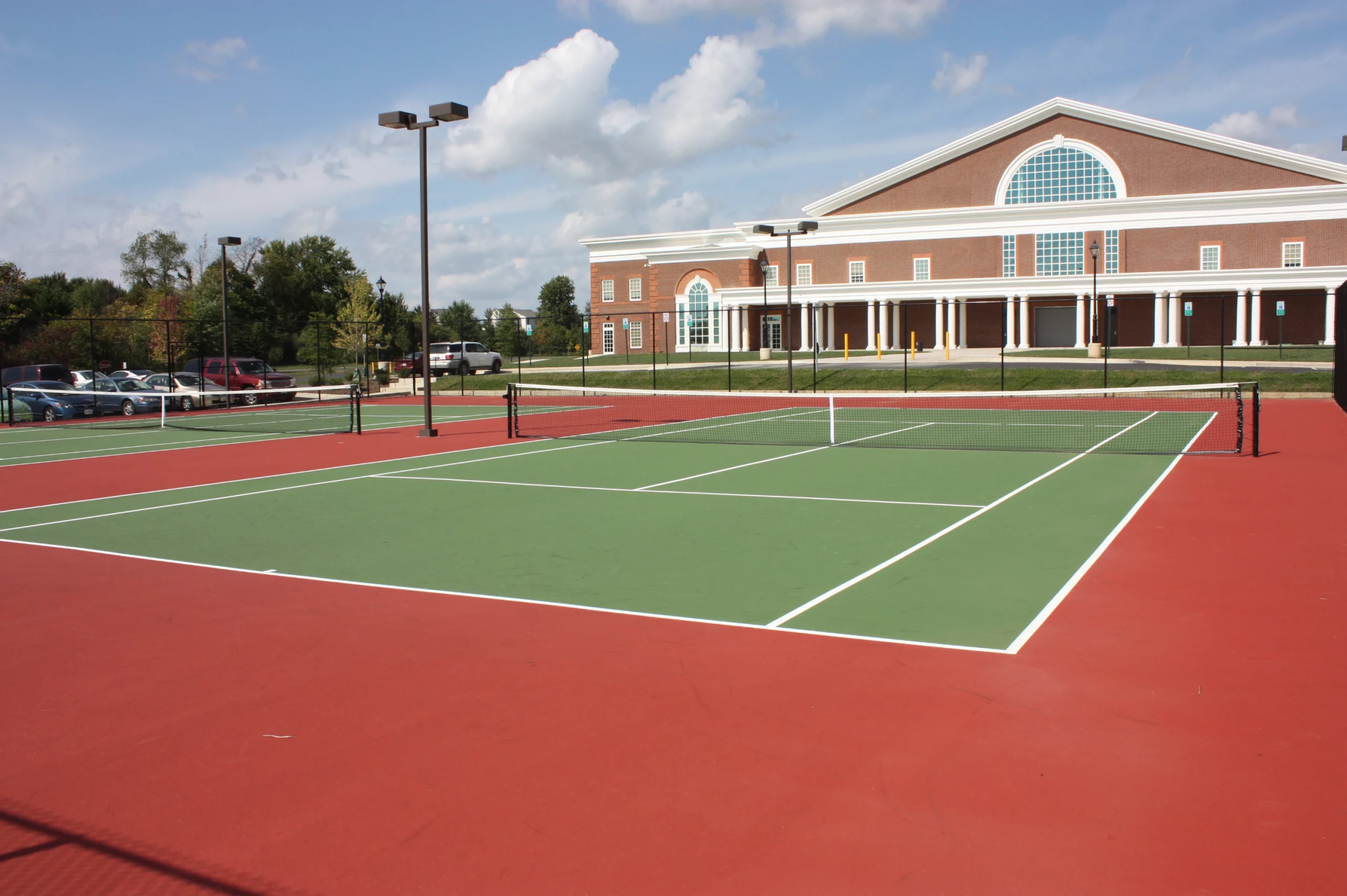 Patrick College tennis court church design
