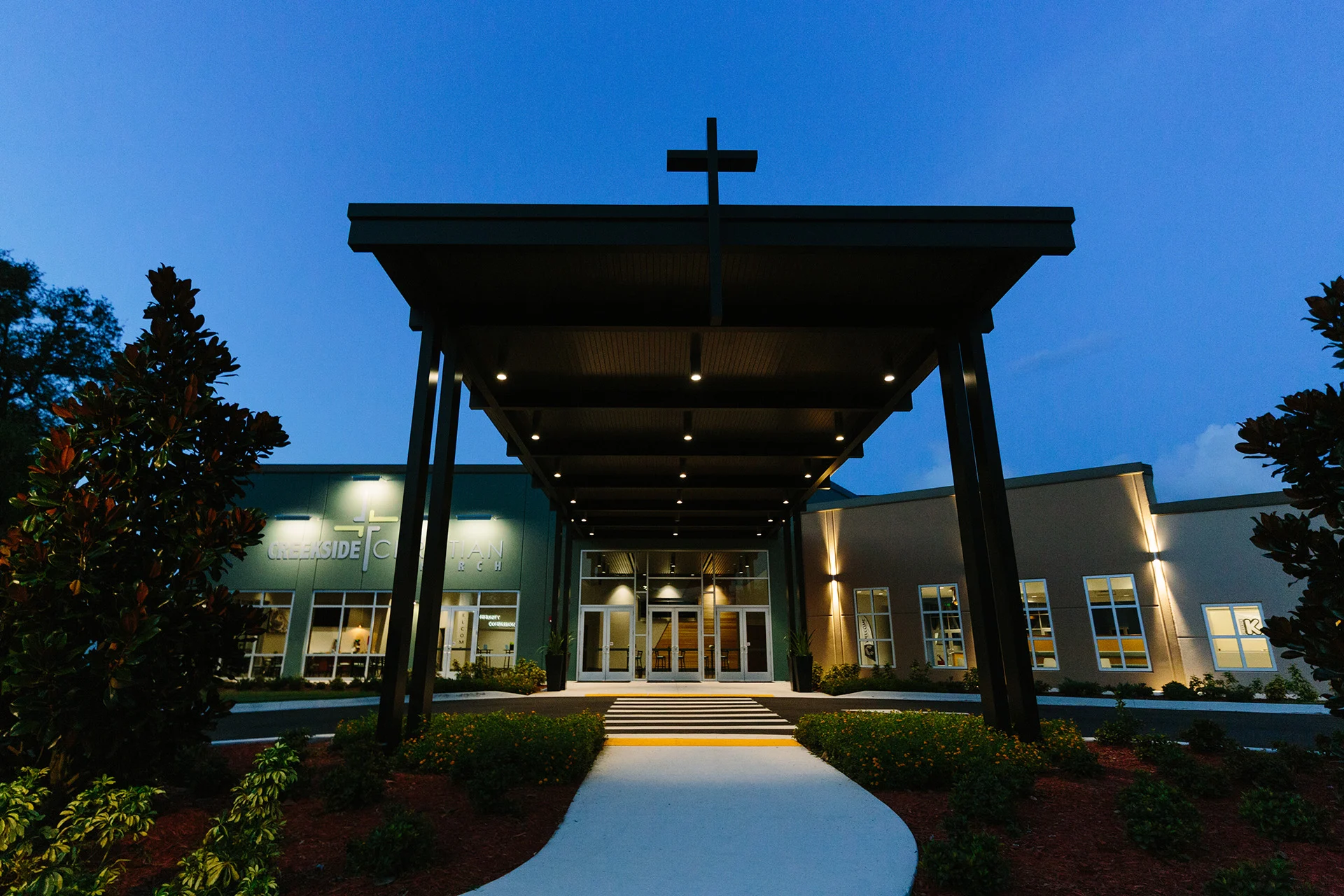Creekside exterior night church building church architect