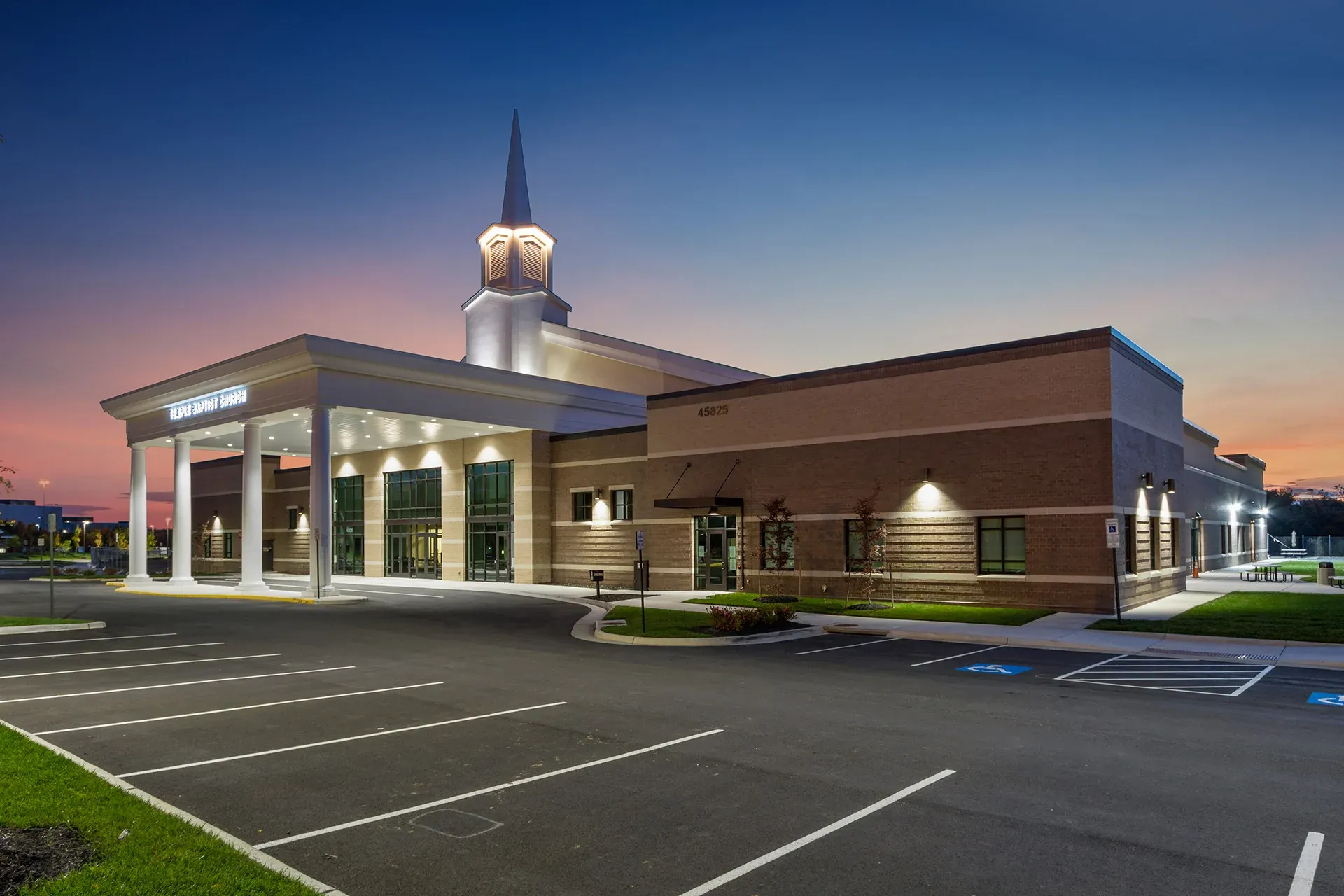 TBC exterior night church building
