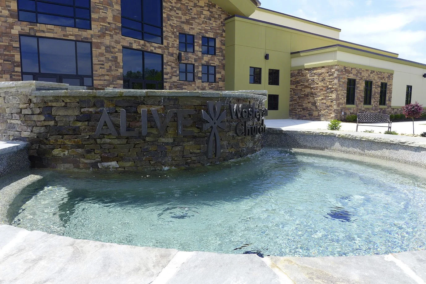 Alive Wesleyan phase exterior water church building church architect