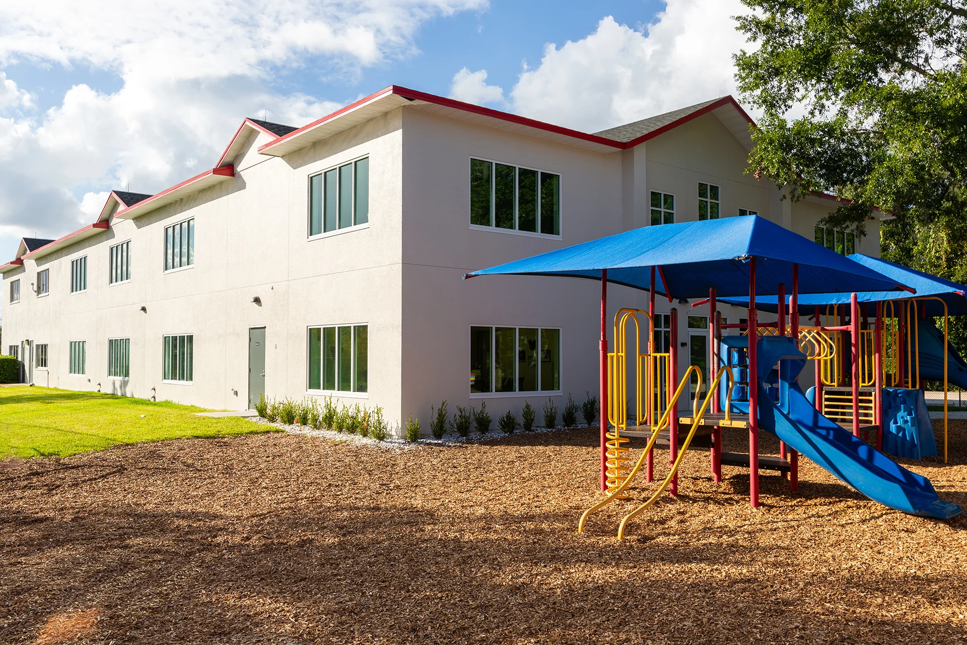 Holy Cross playground church building church architect