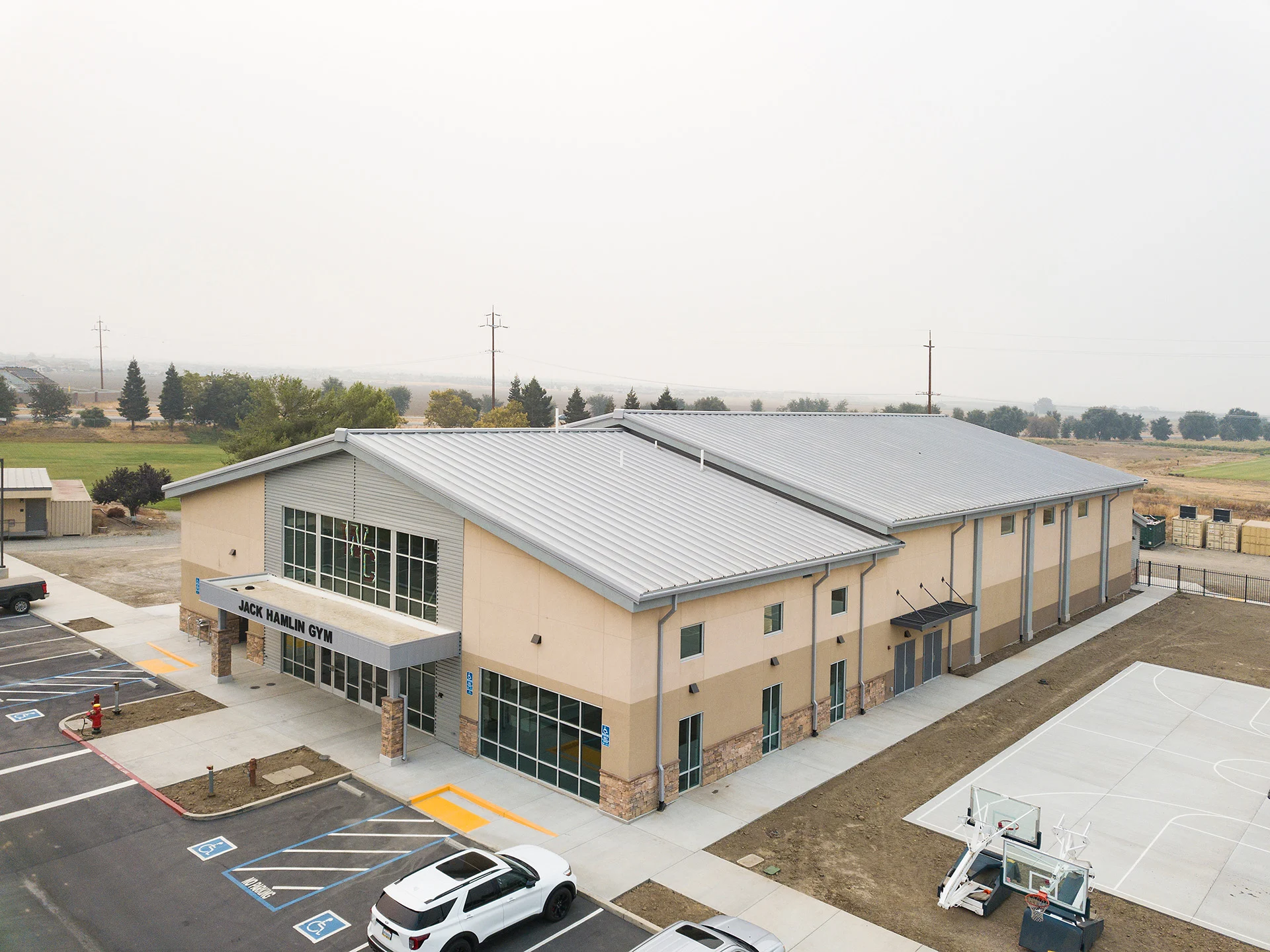 WC-Gym exterior front arial church building church architect
